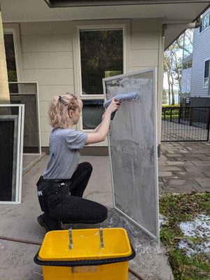 Sequoia cleaning window flyscreens at Murrays Beach