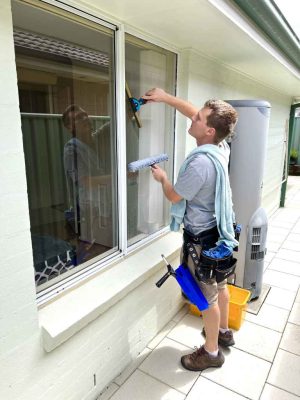 Micah window cleaning at Woy Woy